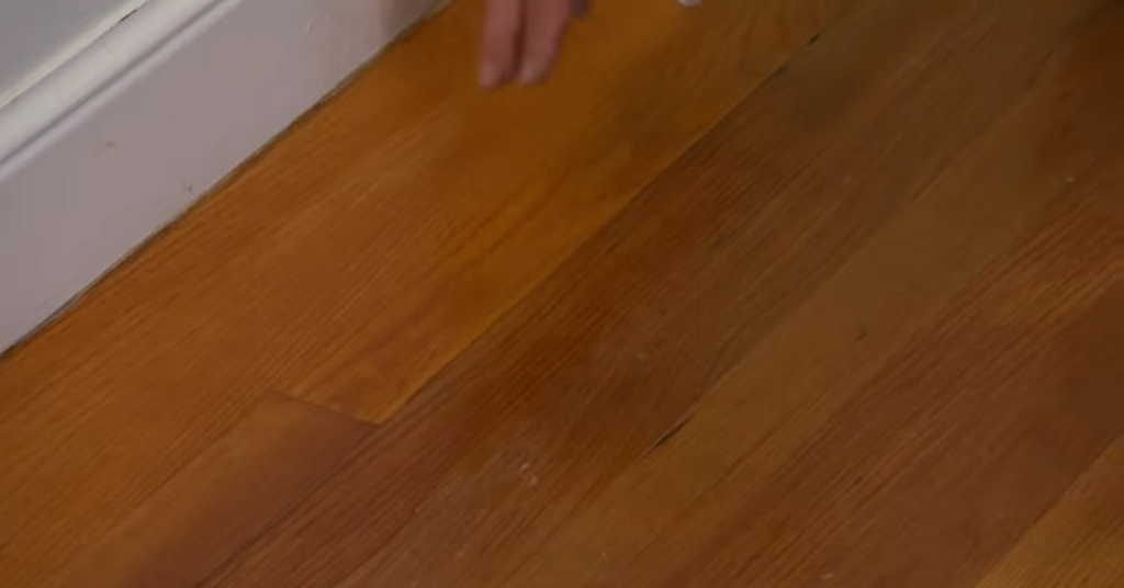 signs of water damage on hardwood floors